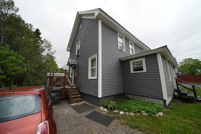 29 Columbia St, Houlton, ME 04730 - view of property exterior with a wooden deck