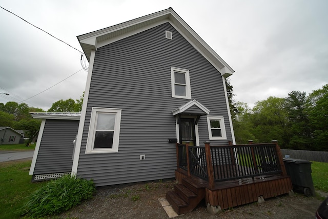 29 Columbia St, Houlton, ME 04730 - view of front facade featuring a wooden deck