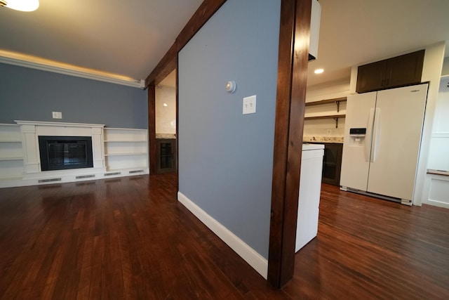 29 Columbia St, Houlton, ME 04730 - unfurnished living room with dark wood finished floors, a glass covered fireplace, baseboards, and recessed lighting