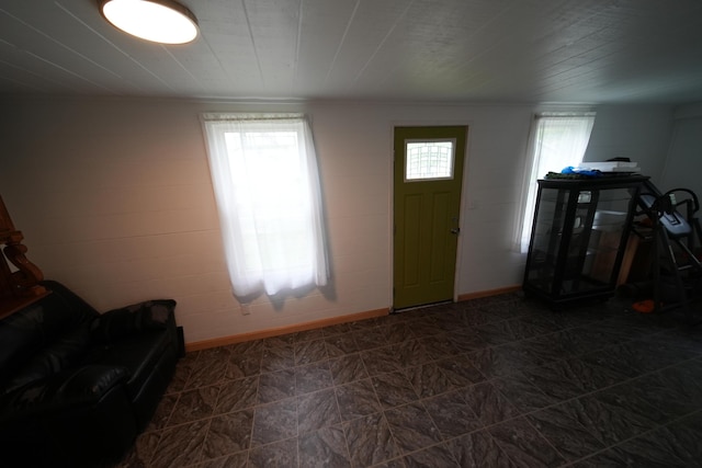 29 Columbia St, Houlton, ME 04730 - foyer featuring healthy amount of natural light, baseboards, and crown molding