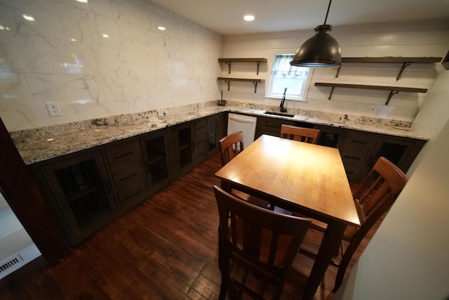 29 Columbia St, Houlton, ME 04730 - kitchen featuring open shelves, white dishwasher, dark wood finished floors, a sink, and backsplash
