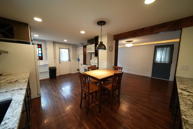 29 Columbia St, Houlton, ME 04730 - dining area with dark wood finished floors, recessed lighting, and baseboards