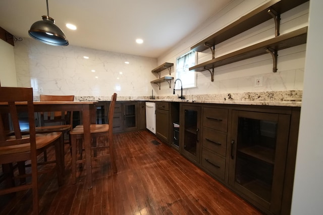 29 Columbia St, Houlton, ME 04730 - bar featuring decorative backsplash, dishwasher, dark wood finished floors, a sink, and recessed lighting
