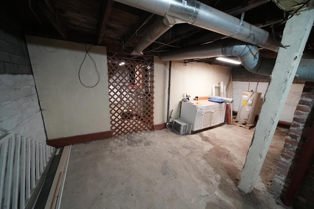 29 Columbia St, Houlton, ME 04730 - unfinished below grade area featuring water heater and a sink