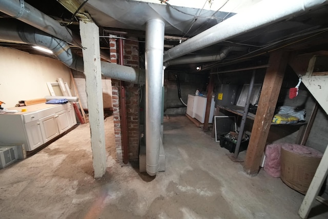 29 Columbia St, Houlton, ME 04730 - unfinished below grade area with washer / dryer