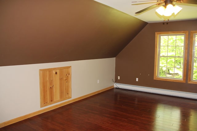 89 Drake Rd, Madison, ME 04950 - additional living space with baseboard heating, dark wood-type flooring, lofted ceiling, baseboards, and ceiling fan