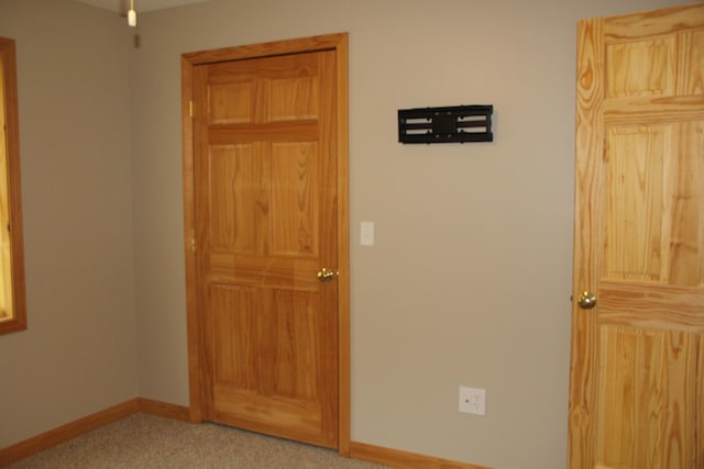 89 Drake Rd, Madison, ME 04950 - unfurnished bedroom with baseboards and carpet