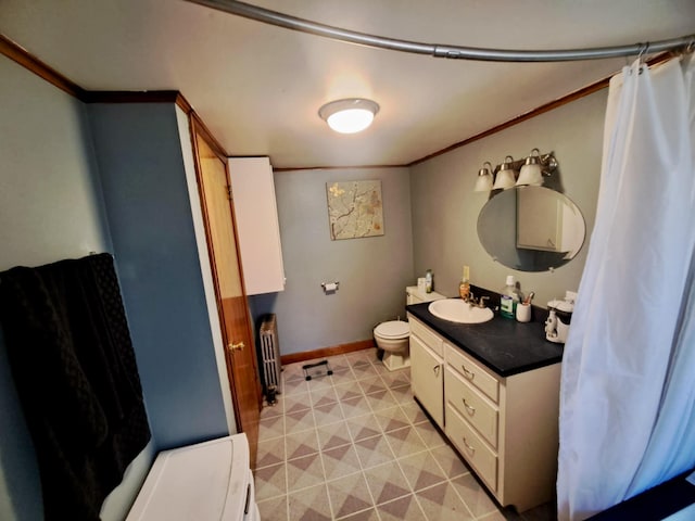 14 Somerset St, Millinocket, ME 04462 - full bathroom with vanity, toilet, tile patterned floors, baseboards, and ornamental molding