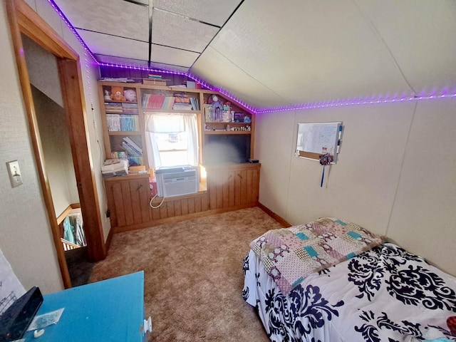 14 Somerset St, Millinocket, ME 04462 - carpeted bedroom with lofted ceiling, cooling unit, and radiator heating unit