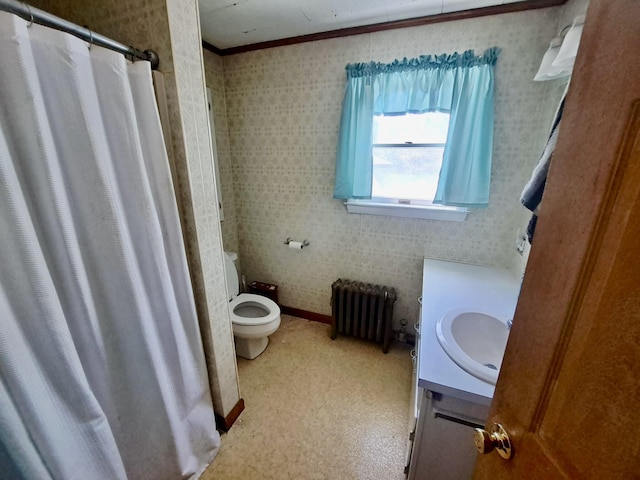 14 Somerset St, Millinocket, ME 04462 - bathroom with radiator heating unit, vanity, toilet, a shower with curtain, and crown molding
