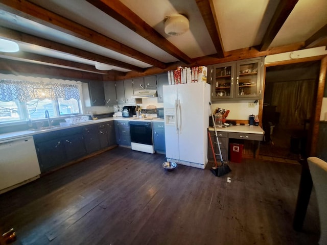 14 Somerset St, Millinocket, ME 04462 - kitchen featuring white appliances, beamed ceiling, under cabinet range hood, dark wood-style floors, and light countertops