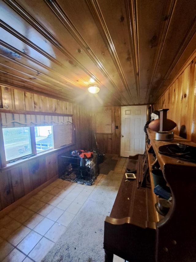 14 Somerset St, Millinocket, ME 04462 - miscellaneous room featuring wood walls, tile patterned floors, and wooden ceiling