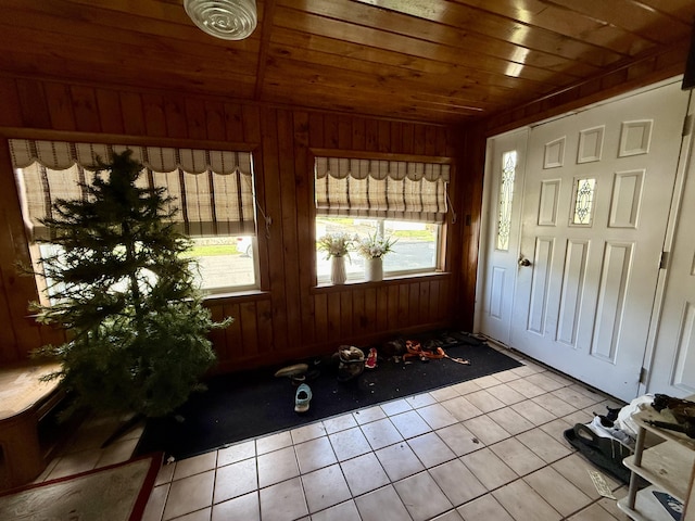 14 Somerset St, Millinocket, ME 04462 - tiled foyer with wood ceiling and wooden walls