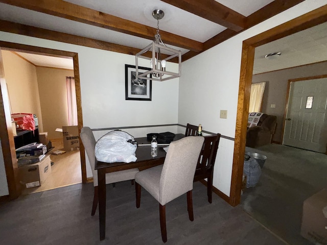 14 Somerset St, Millinocket, ME 04462 - dining area featuring beamed ceiling and a chandelier