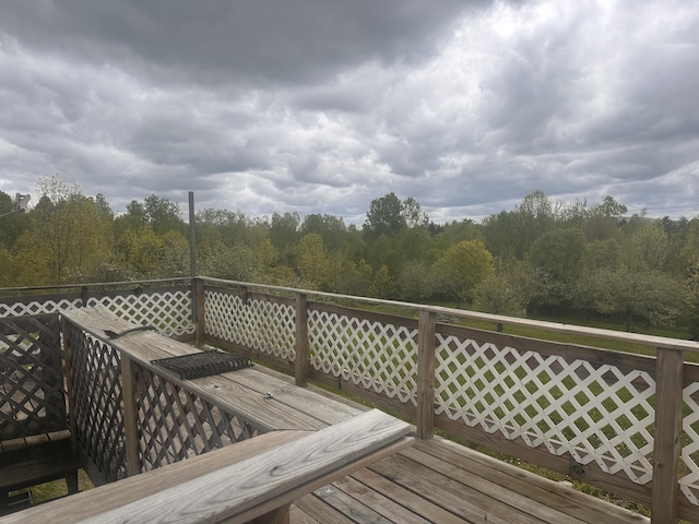 187 Purkis Rd, Buckfield, ME 04220 - wooden deck with a wooded view