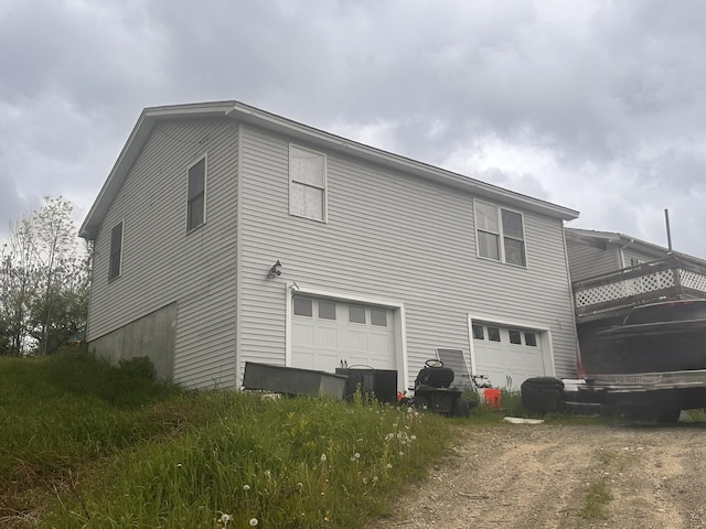 187 Purkis Rd, Buckfield, ME 04220 - view of home's exterior with a garage and driveway