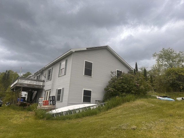 187 Purkis Rd, Buckfield, ME 04220 - view of property exterior featuring a yard and a wooden deck