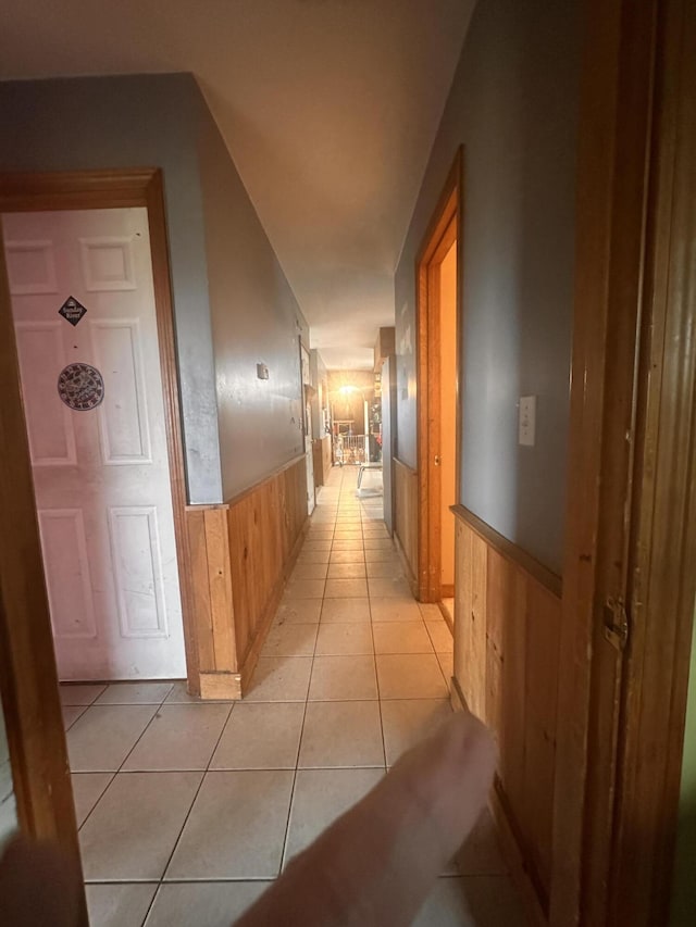 187 Purkis Rd, Buckfield, ME 04220 - hall featuring a wainscoted wall, wood walls, and light tile patterned flooring