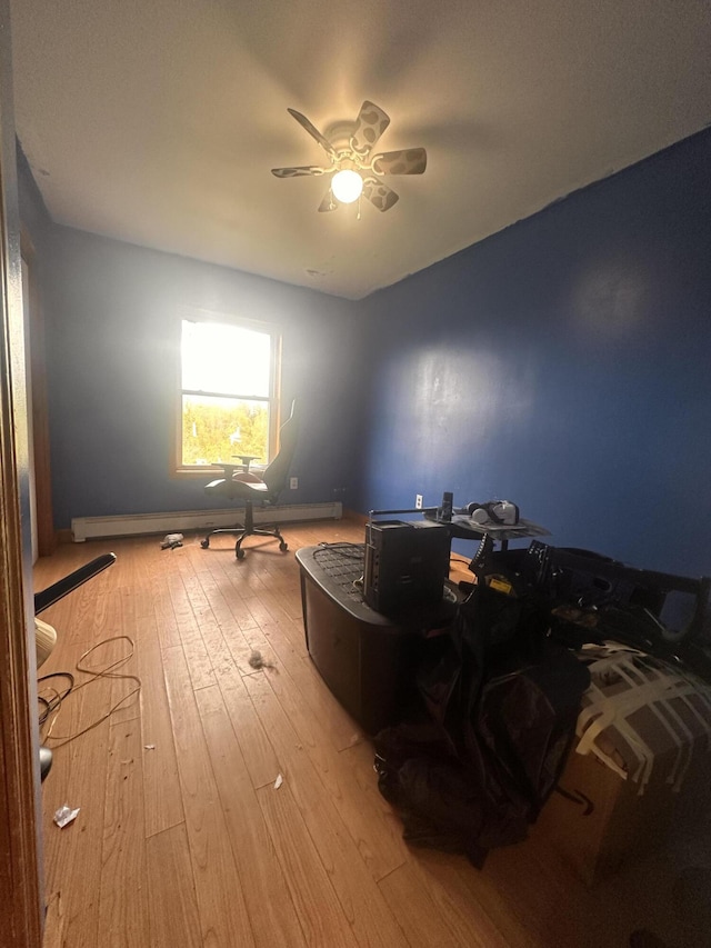 187 Purkis Rd, Buckfield, ME 04220 - bedroom with light wood-style floors, a desk, ceiling fan, and baseboards