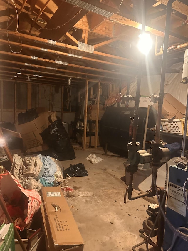 187 Purkis Rd, Buckfield, ME 04220 - unfinished basement featuring oil tank