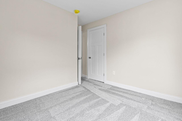 24 Mitton St, Portland, ME 04102 - carpeted empty room featuring baseboards