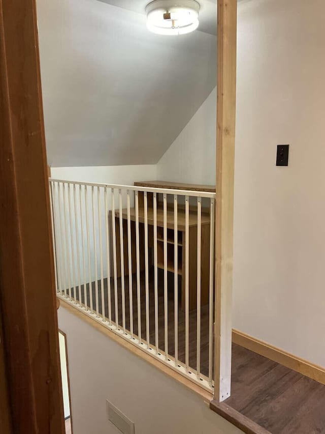 264 Watson Hill Rd, Limerick, ME 04048 - stairway with lofted ceiling, wood finished floors, and baseboards