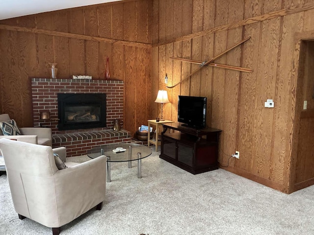 2011 Clark St, Carrabassett Valley, ME 04947 - living area with carpet, wood walls, and a brick fireplace