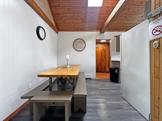 144 Sinclair Rd, Sinclair, ME 04779 - dining area with wooden ceiling, dark wood-type flooring, wood walls, and baseboard heating