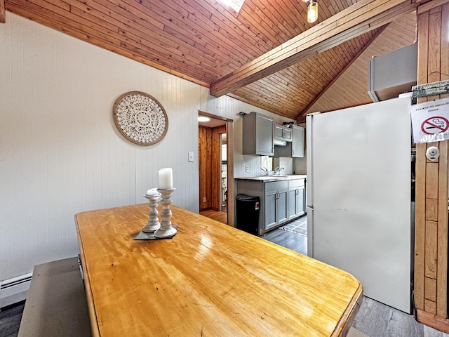 144 Sinclair Rd, Sinclair, ME 04779 - kitchen with wood finished floors, wood walls, wood counters, gray cabinets, and a sink