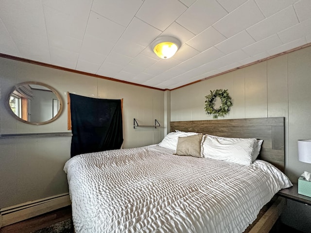144 Sinclair Rd, Sinclair, ME 04779 - bedroom with a baseboard heating unit, crown molding, and lofted ceiling