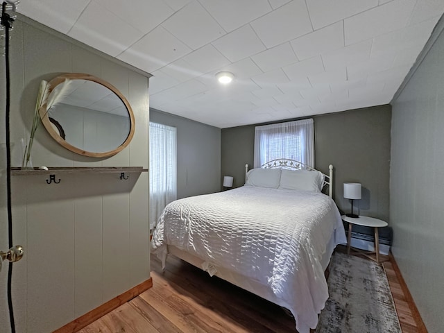 144 Sinclair Rd, Sinclair, ME 04779 - bedroom featuring wood finished floors and baseboards