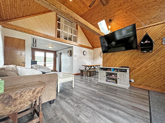 144 Sinclair Rd, Sinclair, ME 04779 - living area featuring wooden walls, wood ceiling, high vaulted ceiling, and wood finished floors