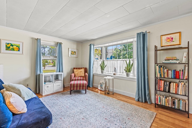 4 Hillside Ave, Biddeford, ME 04005 - living area with wood finished floors and ornamental molding
