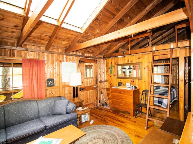44 Cove Ln, Damariscotta, ME 04543 - living area featuring wooden walls, hardwood / wood-style floors, a skylight, and wood ceiling