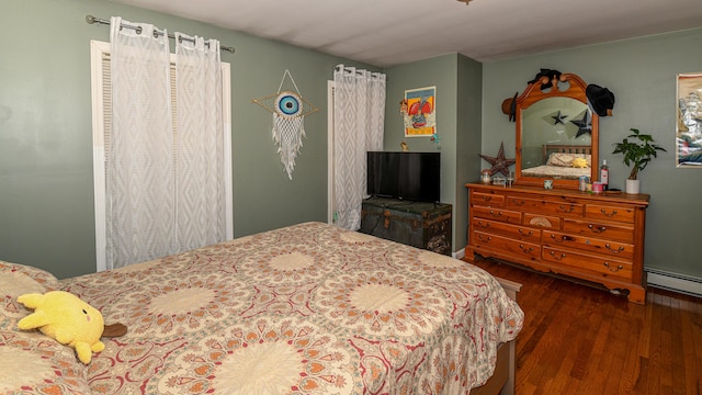 93 Maple St, Fryeburg, ME 04037 - bedroom with wood finished floors and a baseboard radiator