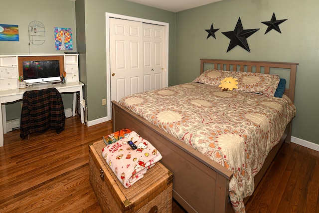 93 Maple St, Fryeburg, ME 04037 - bedroom featuring dark wood-style flooring, baseboards, and a closet