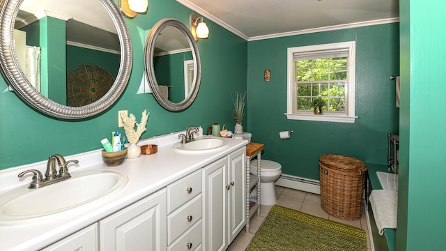93 Maple St, Fryeburg, ME 04037 - bathroom featuring a baseboard radiator, toilet, tile patterned flooring, double vanity, and crown molding