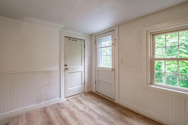 41 Bolton Hill Rd, Augusta, ME 04330 - entrance foyer with light wood-type flooring and a wainscoted wall