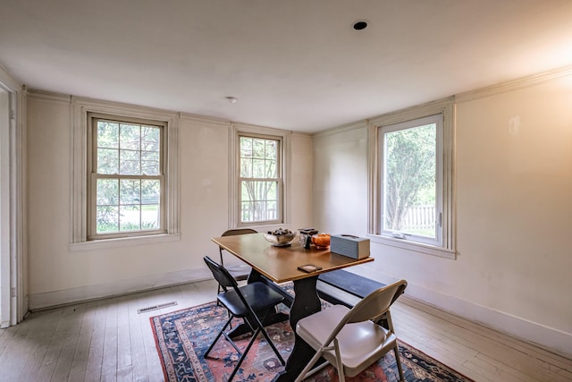 41 Bolton Hill Rd, Augusta, ME 04330 - dining room with light wood-style floors, baseboards, and healthy amount of natural light