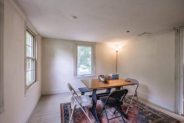 41 Bolton Hill Rd, Augusta, ME 04330 - dining space featuring light wood-style floors, baseboards, an office area, and ornamental molding