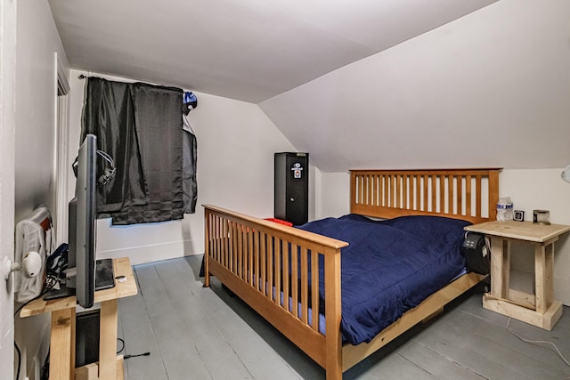 41 Bolton Hill Rd, Augusta, ME 04330 - bedroom with lofted ceiling, wood finished floors, and baseboards