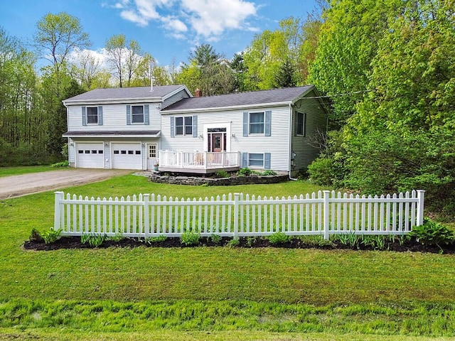 25 Parmenter Ter, China, ME 04358 - raised ranch featuring a garage, dirt driveway, and a wooden deck