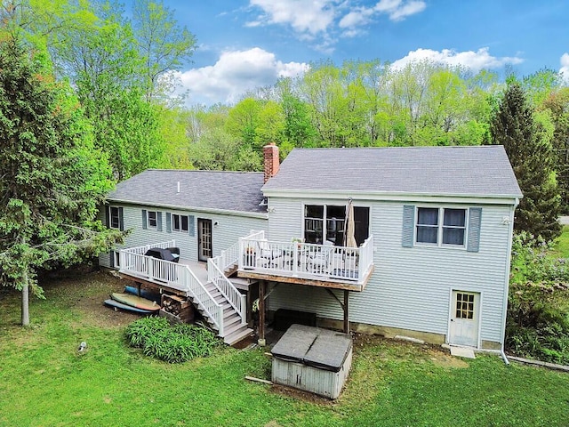 25 Parmenter Ter, China, ME 04358 - back of property featuring a wooden deck, a chimney, a lawn, and a shingled roof