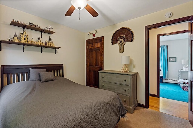 25 Parmenter Ter, China, ME 04358 - bedroom featuring light carpet, a baseboard heating unit, ceiling fan, and baseboards