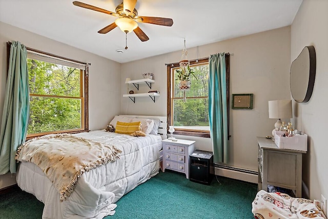 25 Parmenter Ter, China, ME 04358 - bedroom featuring dark colored carpet, baseboard heating, and a ceiling fan