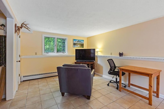 25 Parmenter Ter, China, ME 04358 - office with a baseboard heating unit, light tile patterned flooring, a textured ceiling, and baseboards