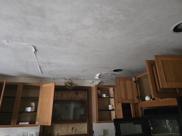 12 Middle Jam Rd, Gorham, ME 04038 - kitchen featuring open shelves and brown cabinetry