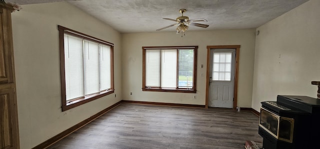 18 Pine St, Skowhegan, ME 04976 - entrance foyer featuring ceiling fan, wood finished floors, a textured ceiling, and baseboards