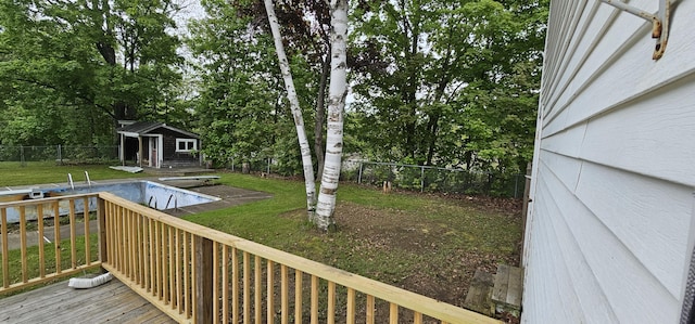 18 Pine St, Skowhegan, ME 04976 - wooden deck featuring an outdoor structure and view of wooded area