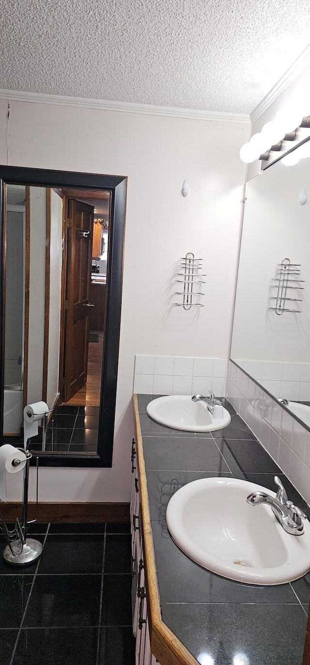 18 Pine St, Skowhegan, ME 04976 - full bathroom featuring a textured ceiling, double vanity, and ornamental molding